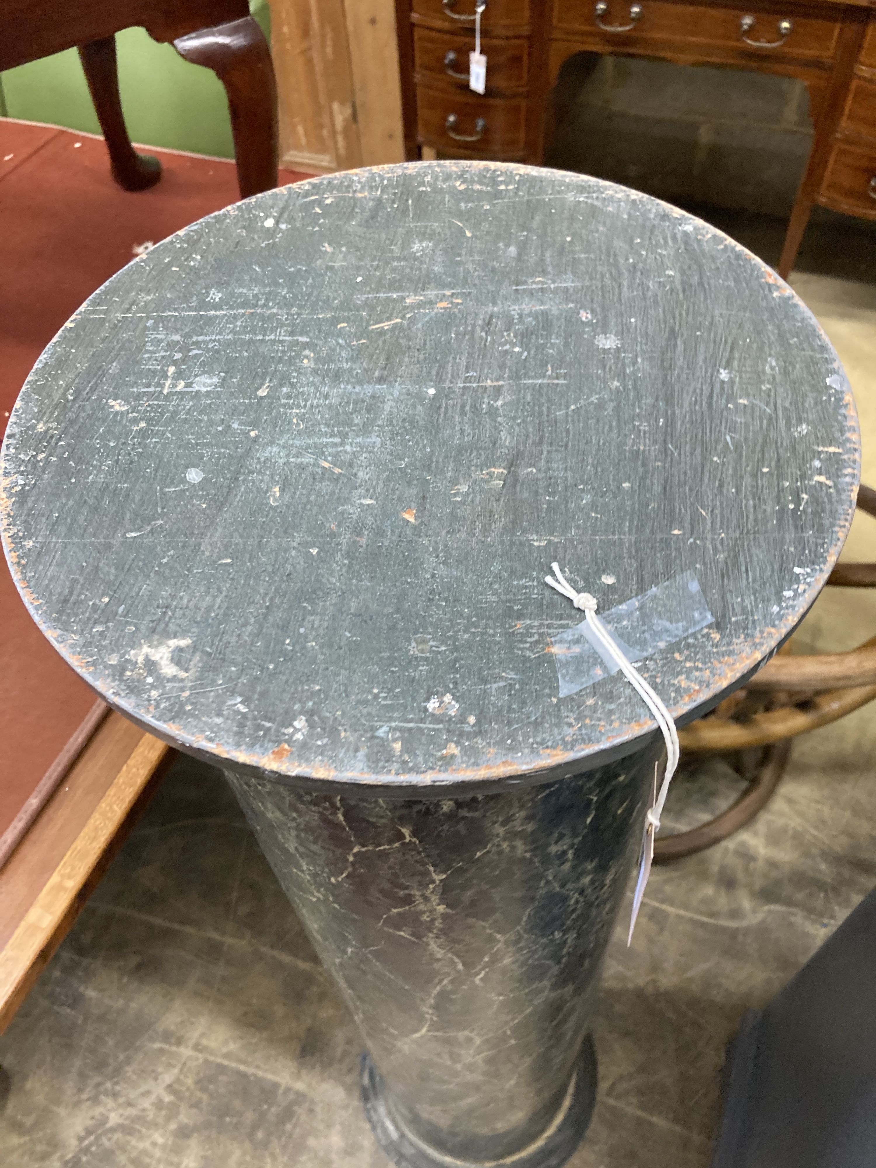 A painted faux marble pedestal, height 124cm